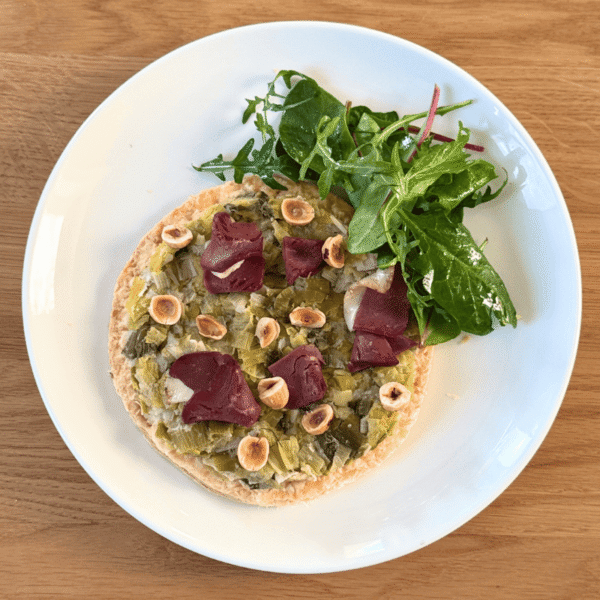 Commande d'une entrée Tarte au poireaux et magret fumé